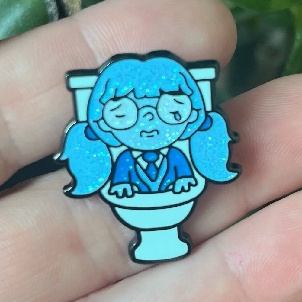 Brand new wizard inspired blue sparkly Moaning Mrytle pin